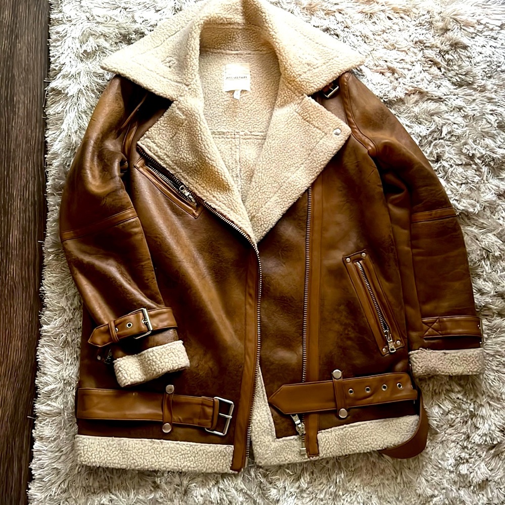 Faux leather and Sherpa jacket with silver finishing/buckles. Worn once